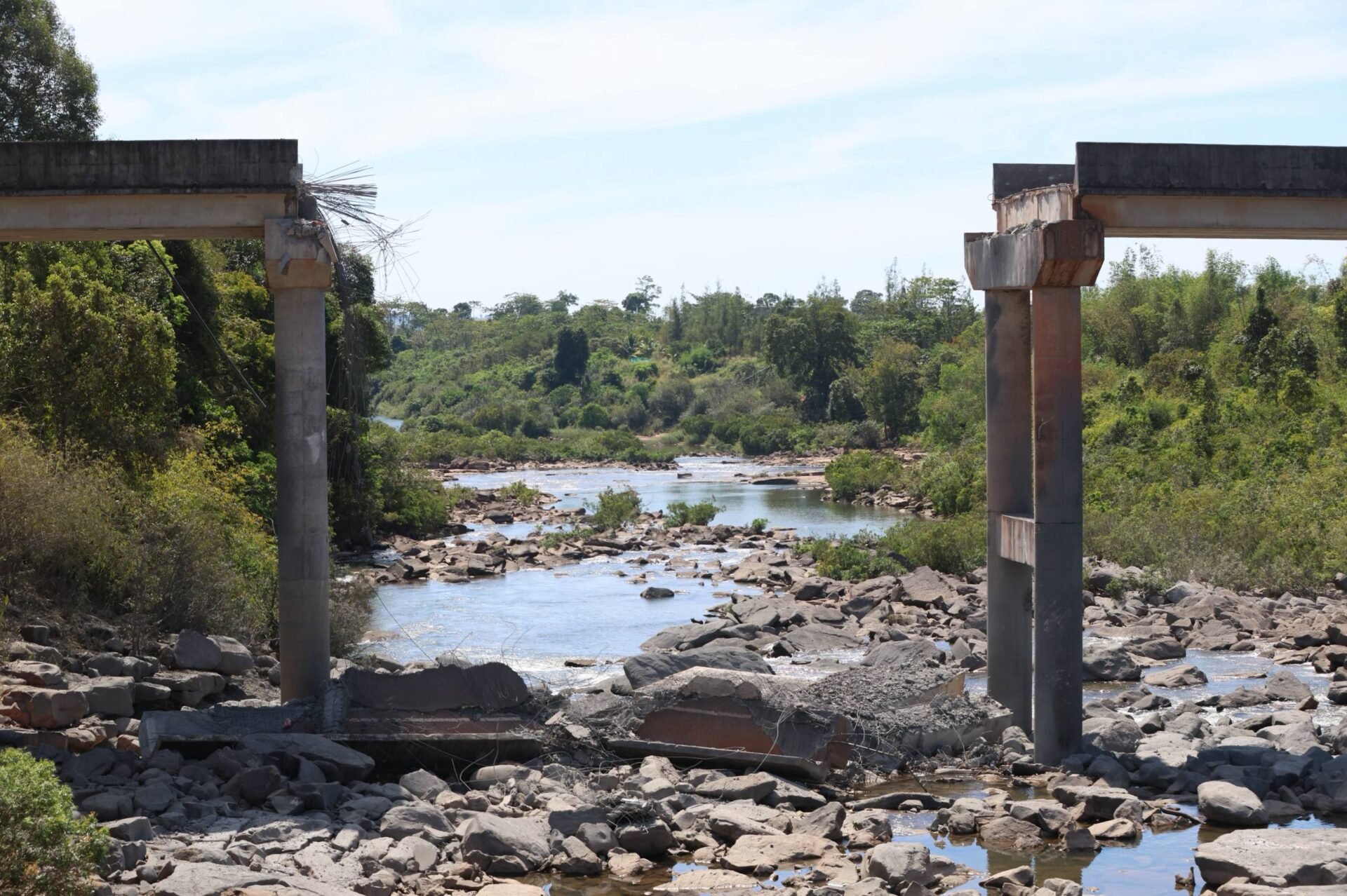 Me Thoeuk Bridge, also known as the Victory Bridge, in Thmar Da, Pursat province, is completely destroyed after being bombed continuously by Thai F-16 fighter jets on the afternoon of December 13, 2025, following attacks from the previous morning. (AKP)